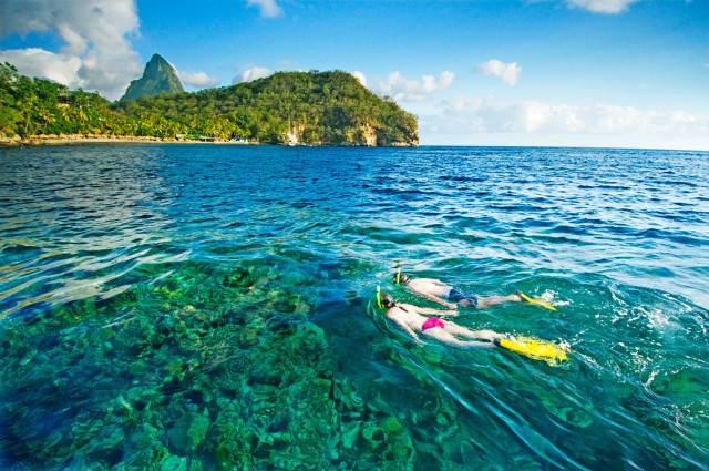 Person floating ocean yellow kayak free wallpaper - medium preview image