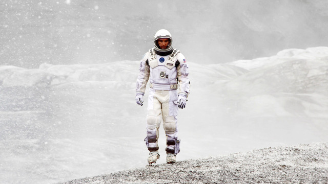 Man space suit hill snow free wallpaper - medium preview image