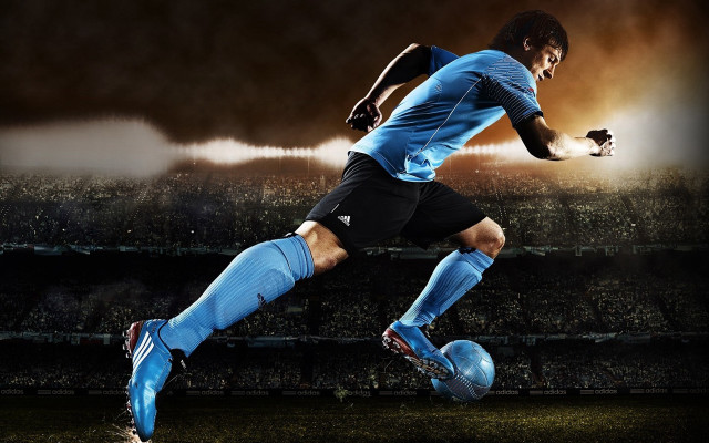 Soccer player kicking ball stadium #4 free wallpaper - medium preview image
