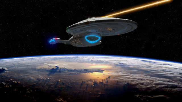 Spaceship flying earth laserbeam bright free wallpaper - medium preview image
