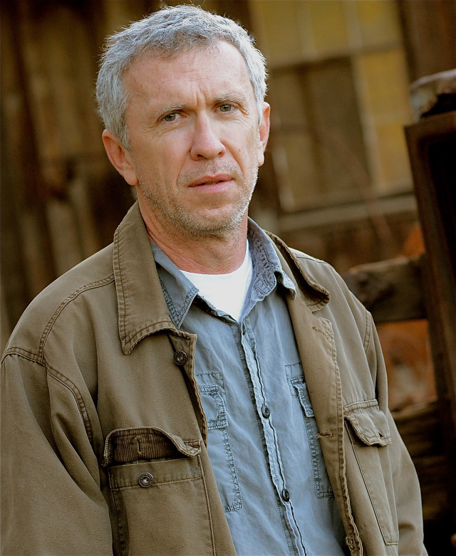 Man gray hair blue shirt free wallpaper - medium preview image