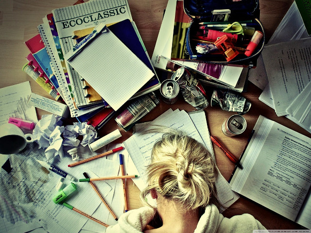 Woman sitting table papers pens free wallpaper - medium preview image
