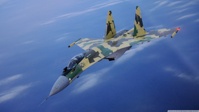 Camouflaged fighter jet flying sky #3 free wallpaper - medium preview image