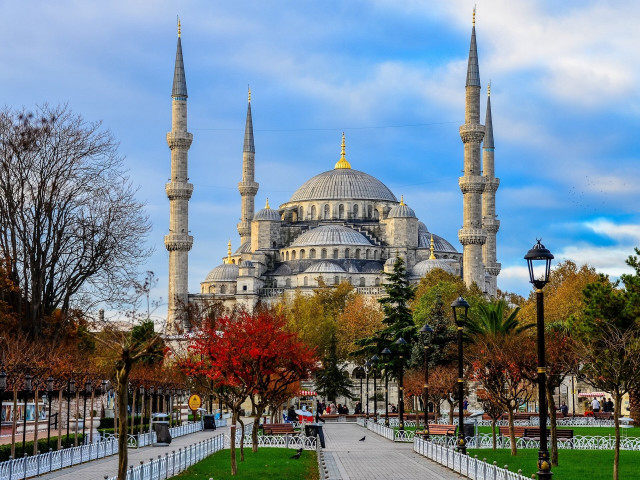 Large spired building walkway hurufiyya free wallpaper - medium preview image