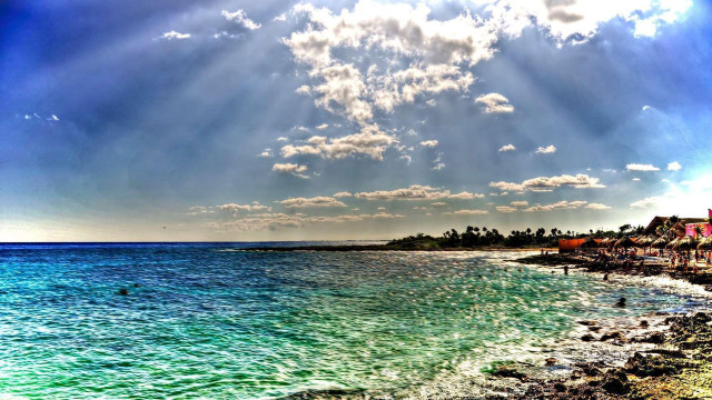 Beach sunbeam blue sky clouds free wallpaper - medium preview image