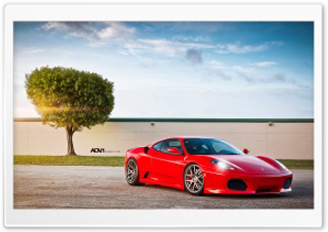Red sports car tree building free wallpaper - medium preview image