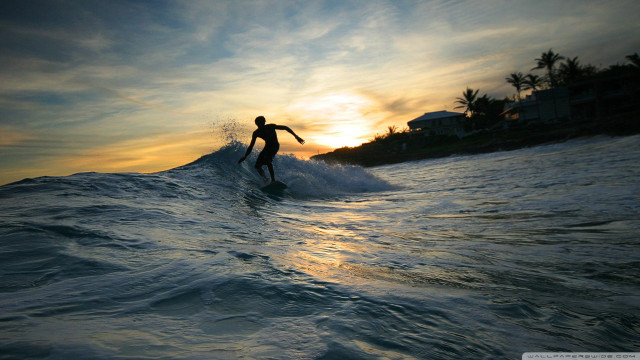 Man surfing wave sunset house free wallpaper - medium preview image