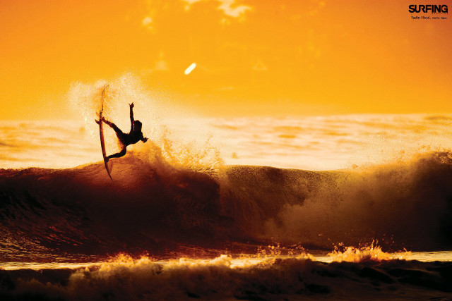 Surfer jumping off wave sunset free wallpaper - medium preview image