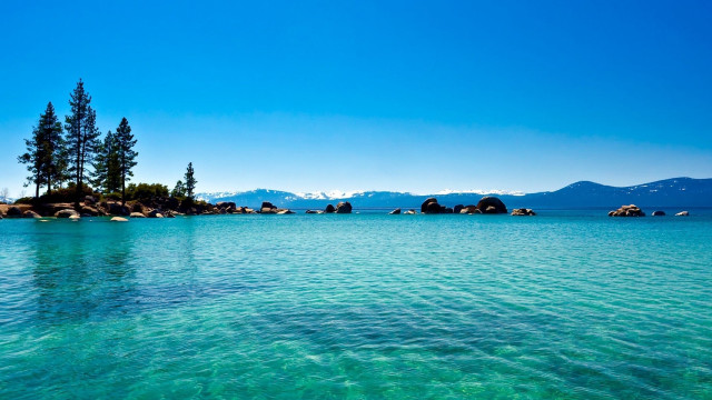 Water island mountains blue sky free wallpaper - medium preview image
