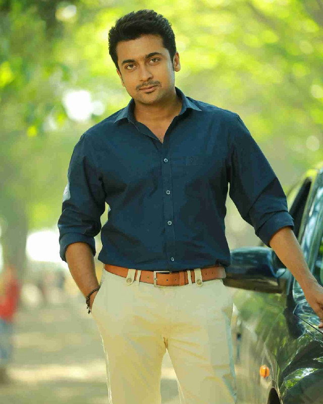 Man blue shirt standing car free wallpaper - medium preview image