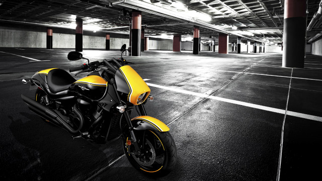 Yellow motorcycle parking garage parking free wallpaper - medium preview image