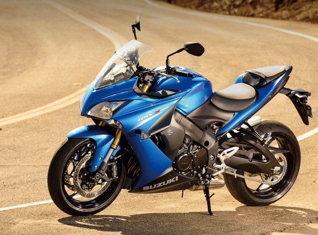 Blue motorcycle road hill curve free wallpaper - medium preview image
