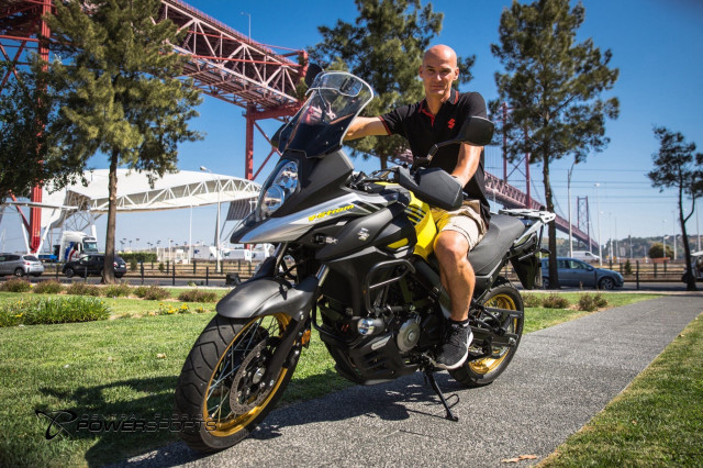 Man motorcycle road bridge city free wallpaper - medium preview image