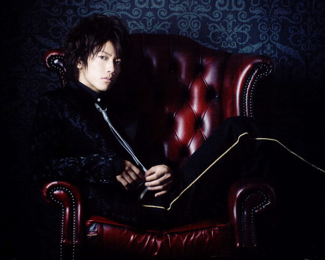Man sitting red chair sword free wallpaper - medium preview image