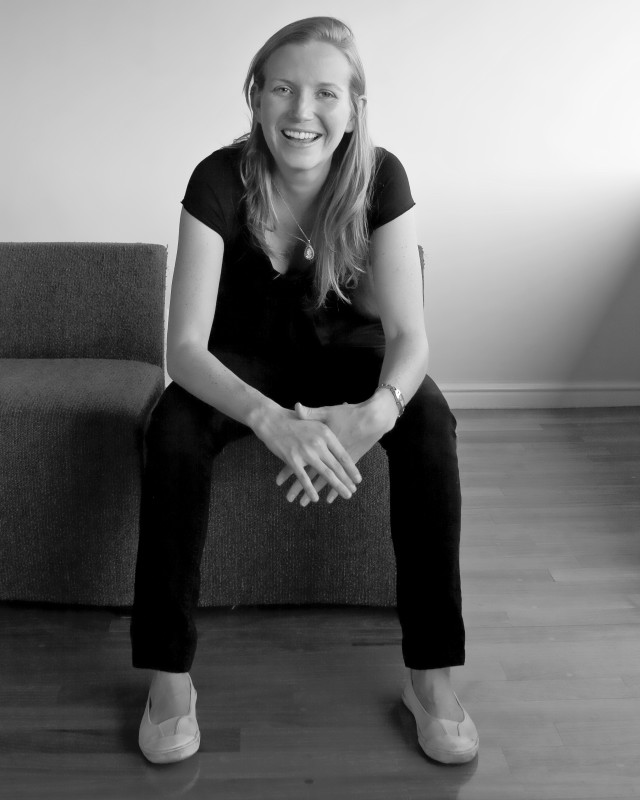 Woman smiling couch hands knees free wallpaper - medium preview image