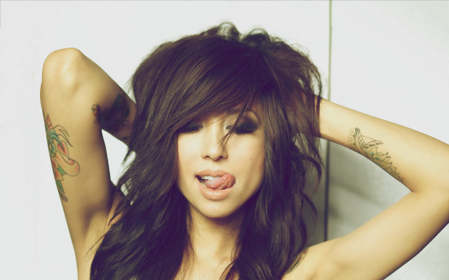 Tattooed woman pose purple hair free wallpaper - medium preview image