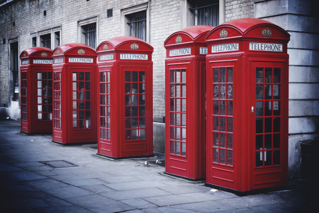Red telephone booths brick building free wallpaper - medium preview image