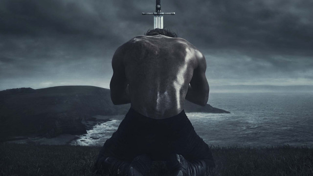 Man sword hill ocean cross free wallpaper - medium preview image