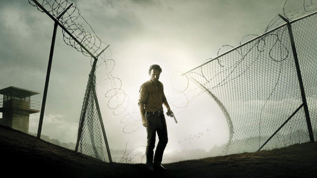 Man holding gun fence barbed free wallpaper - medium preview image