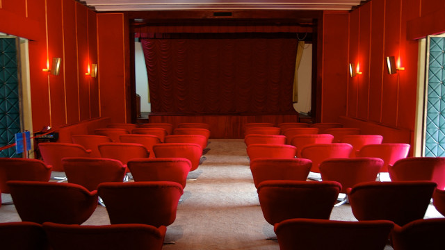Red chairs curtained area center free wallpaper - medium preview image