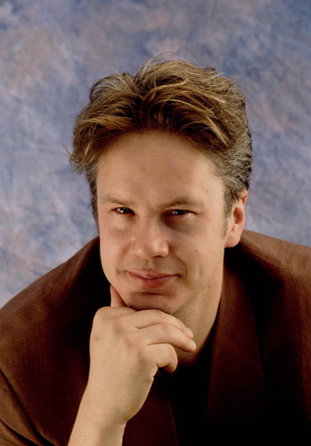 Man brown shirt jacket posing free wallpaper - medium preview image