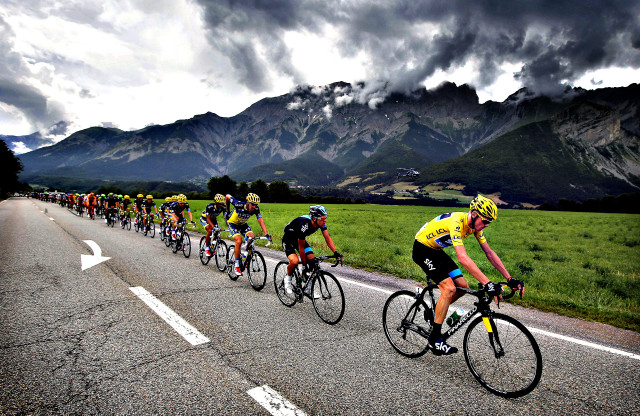 Cyclists road mountain range cloudy free wallpaper - medium preview image