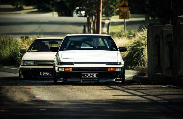 White car parking fence grass free wallpaper - medium preview image