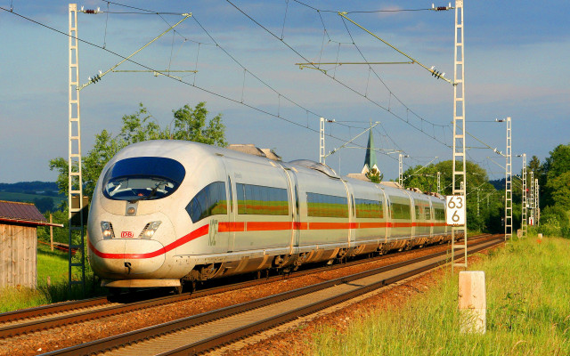 Train traveling tracks building trees free wallpaper - medium preview image
