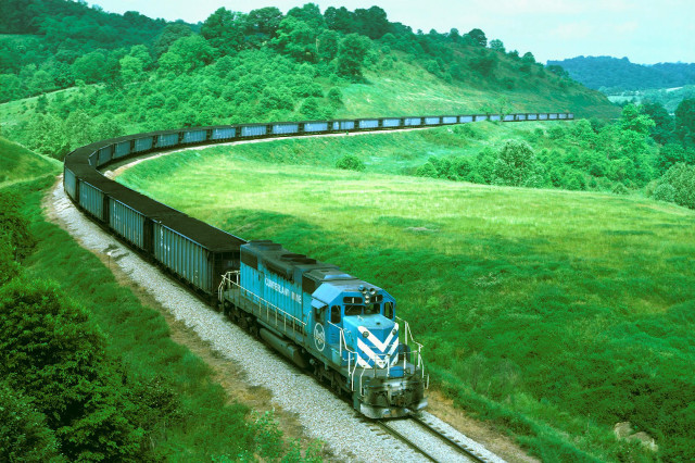 Train traveling countryside green field free wallpaper - medium preview image
