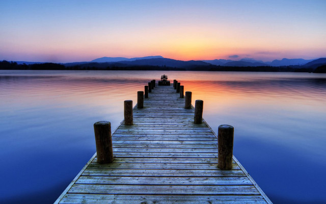 Dock sunset mountains water foreground free wallpaper - medium preview image