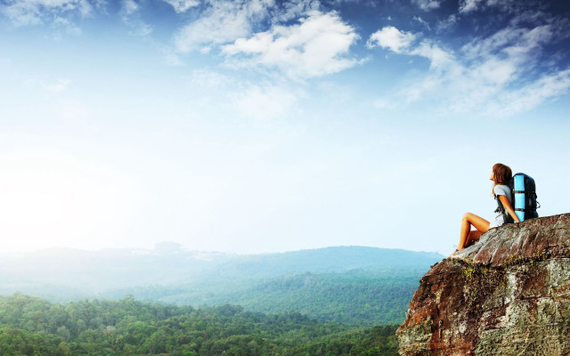 Person sitting rock mountains trees free wallpaper - medium preview image