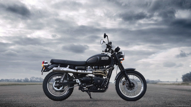 Motorcycle parked road cloudy sky free wallpaper - medium preview image