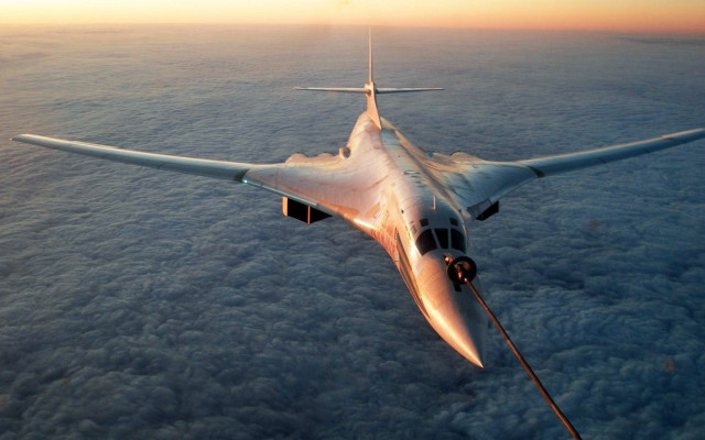 Plane flying above clouds sunset free wallpaper - medium preview image