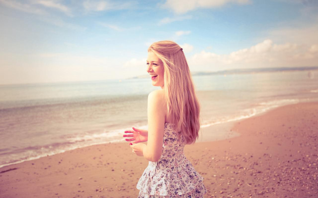 Woman beach ocean frisbee sky #2 free wallpaper - medium preview image