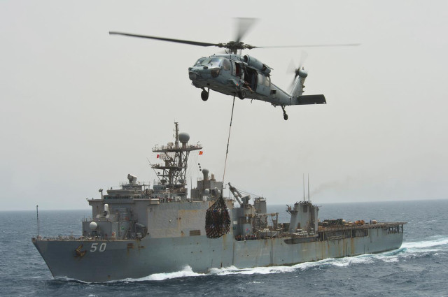 Helicopter lifting ship water shore free wallpaper - medium preview image