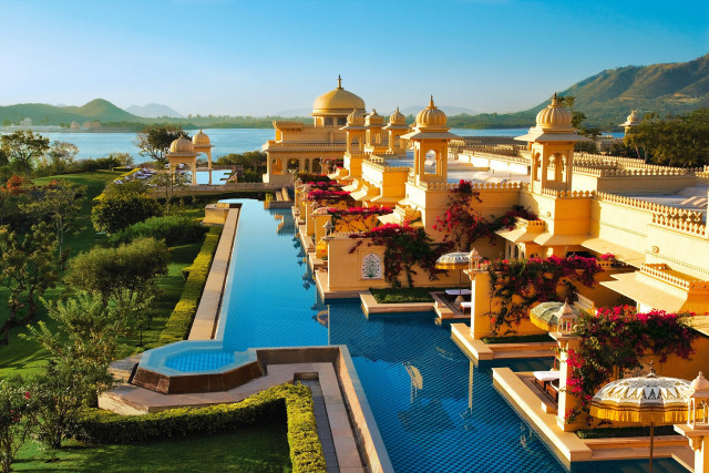 Pool fountain building mountains cityscape free wallpaper - medium preview image