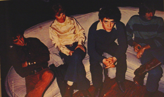 Young men sitting on bed free wallpaper - medium preview image