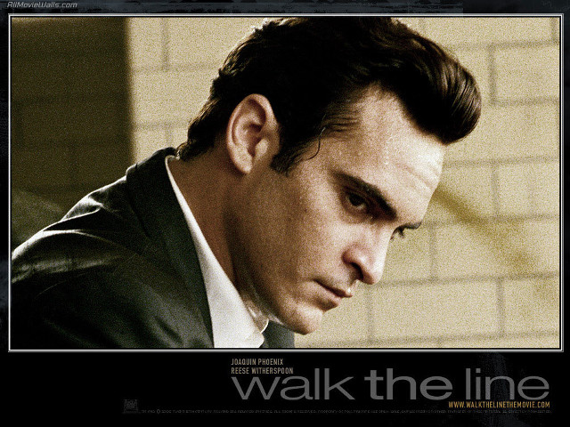 Man suit tie serious expression free wallpaper - medium preview image