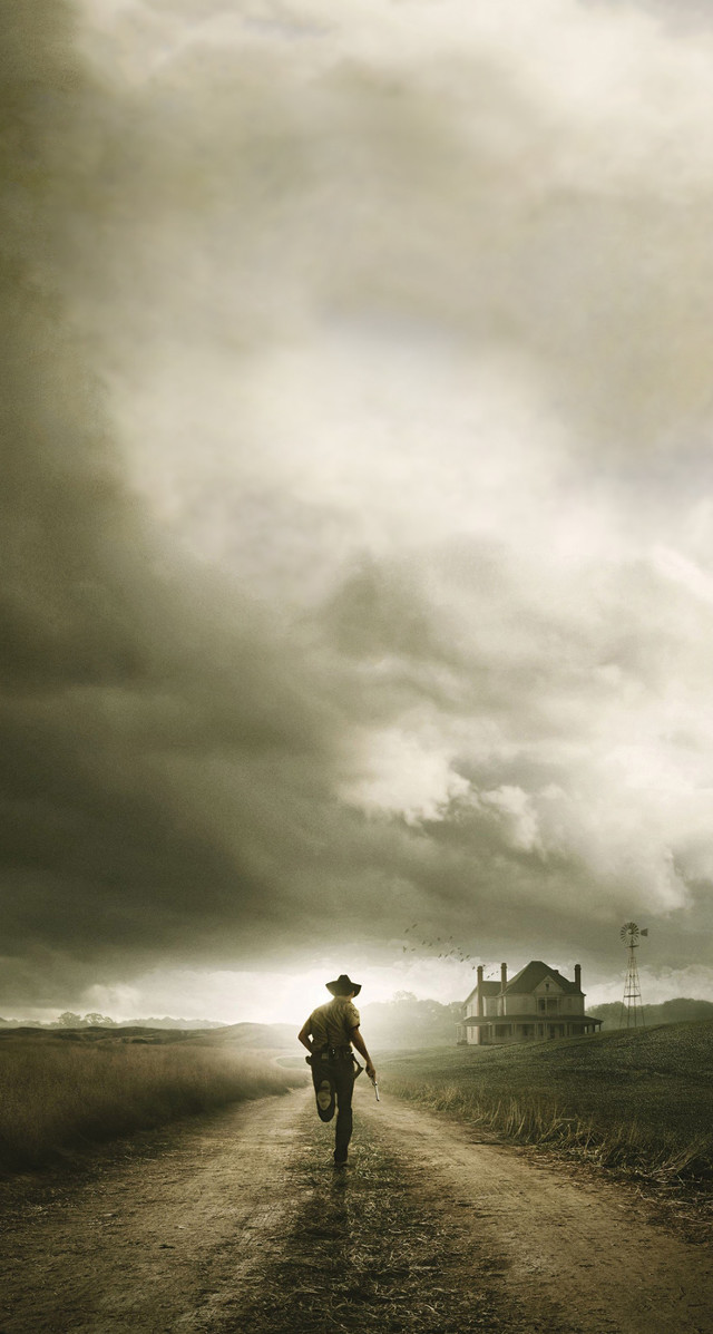 Man walking dirt road cloudy free wallpaper - medium preview image