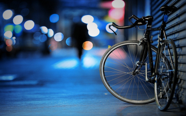 Bicycle parked wall city street free wallpaper - medium preview image
