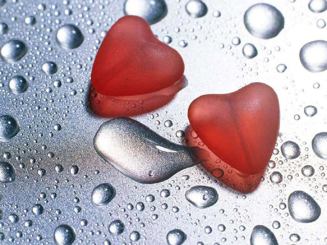 Two red hearts wet surface free wallpaper - medium preview image