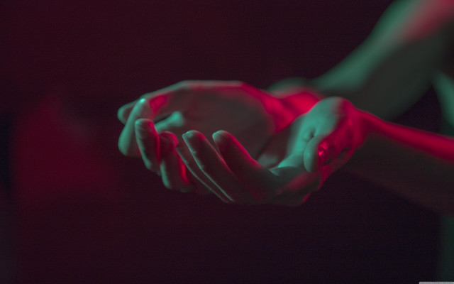 Person holding ball red light free wallpaper - medium preview image