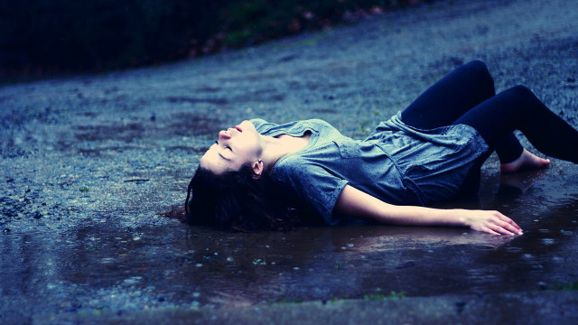 Woman laying rain eyes closed free wallpaper - medium preview image