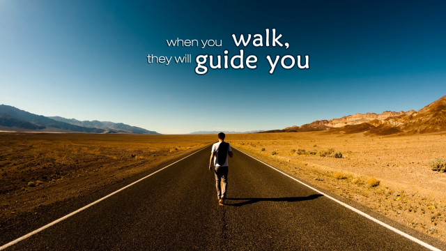 Man walking down road with free wallpaper - medium preview image