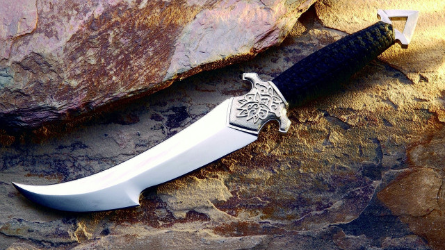 Celtic knife rock holder design free wallpaper - medium preview image