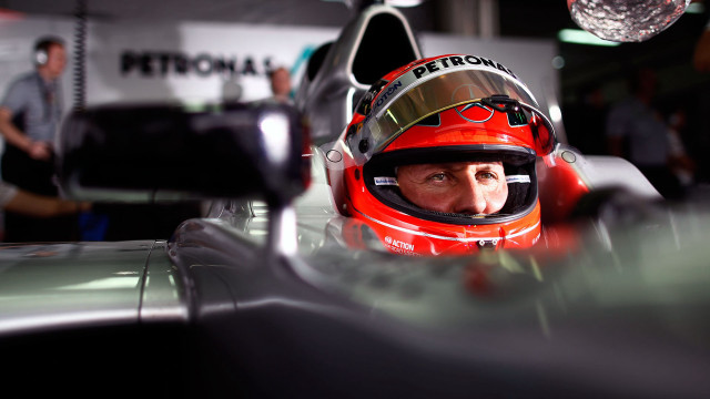 Man red helmet car garage free wallpaper - medium preview image