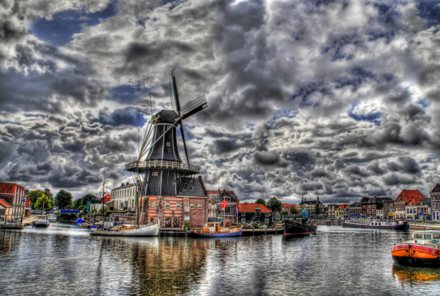 Windmill water boats cloudy sky free wallpaper - medium preview image