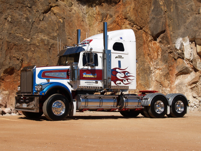Semi truck rocky cliff red free wallpaper - medium preview image