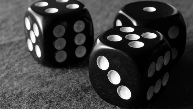 Black dices on table next free wallpaper - medium preview image