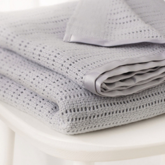 Stack folded blankets white table free wallpaper - medium preview image